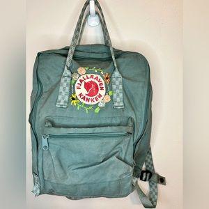 Fjallraven backpack hand embroidered floral design with checkerboard straps